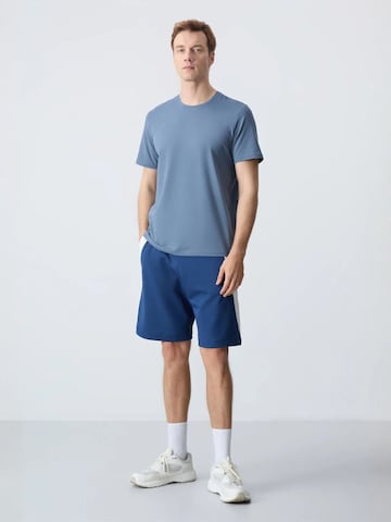 Regular Pantalon Tommy Life en bleu