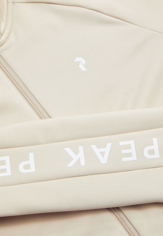 Veste mi-saison PEAK PERFORMANCE en beige