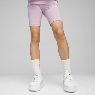 Skinny Pantalon de sport 'ESS+' PUMA en violet : devant