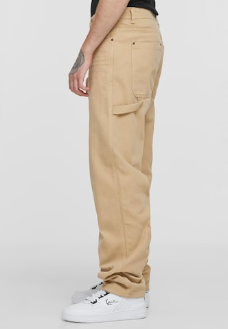 Karl Kani Lużny krój Jeansy w kolorze beżowy