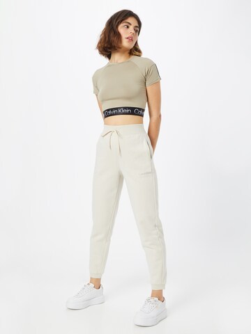 Calvin Klein Sport Zúžený Kalhoty – béžová
