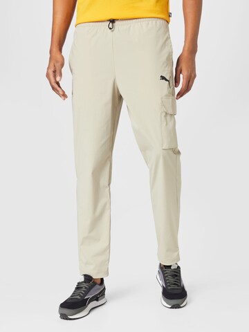 PUMA Regular Workout Pants in Beige: front