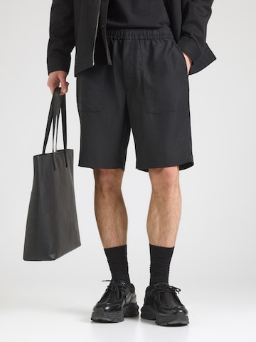 Calvin Klein Ohlapna forma Hlače | črna barva: sprednja stran