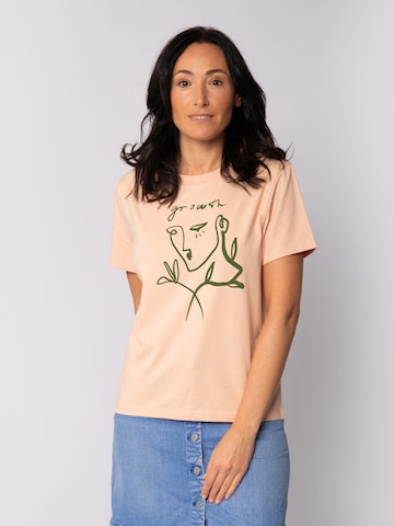 T-shirt ' Growth' Watapparel en orange : devant