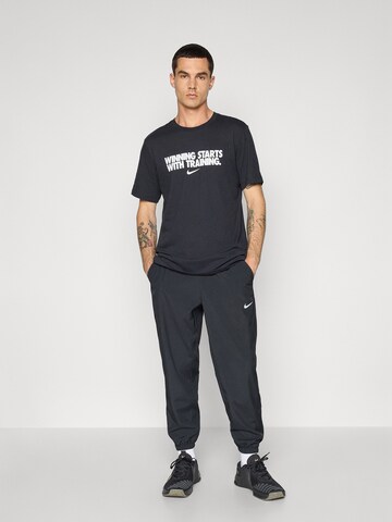 NIKE - Camiseta funcional 'WINNING' en negro