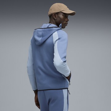 PUMA Sportsweatvest 'Evostripe' in Blauw