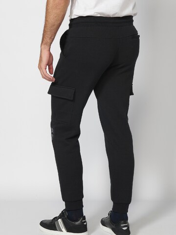 KOROSHI Tapered Cargobroek in Zwart