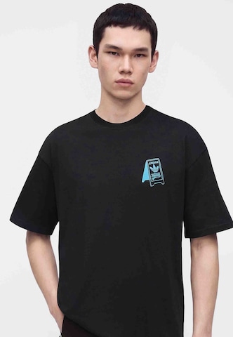 ADIDAS ORIGINALS T-Shirt 'Food Cart' in Schwarz