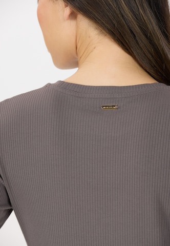 Athlecia Functioneel shirt 'Lankae' in Bruin