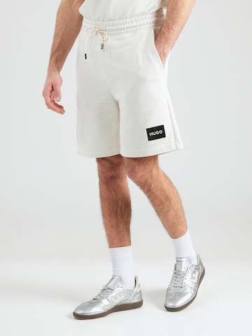 HUGO Loosefit Παντελόνι 'Darix' σε μπεζ: μπροστά