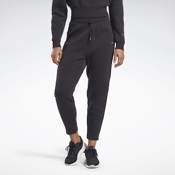 Reebok Tapered Workout Pants in Black: front