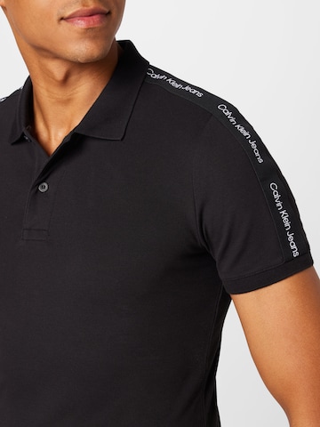 Calvin Klein Jeans Poloshirt in Schwarz