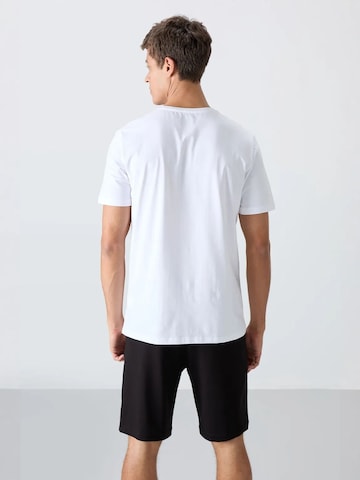 Completo sportivo di Tommy Life in nero