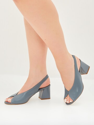 CESARE GASPARI Slingback pumps in Blue: front