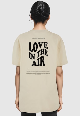 Merchcode - Camiseta 'Love In The Air' en beige: frente