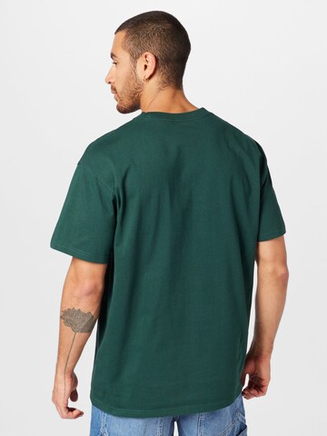 Carhartt WIP T-Shirt 'Chase' in Grün