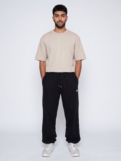 THE NORTH FACE Pantalon 'M ESS TERRY SD RLX PANT TNF BLACK' en 46 en noir, Vue avec produit