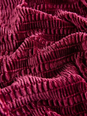 sarkans Next Adīta jaka