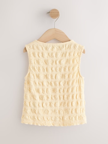 Top de la Next pe galben