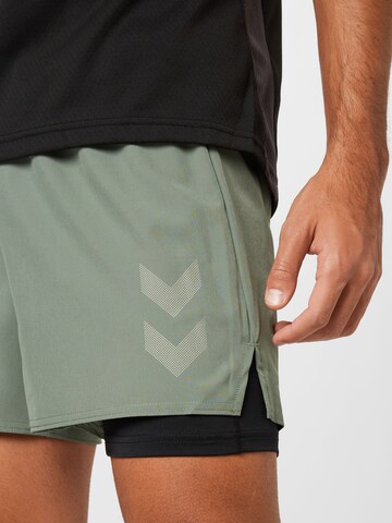 Hummel Regular Workout Pants 'Force' in Green