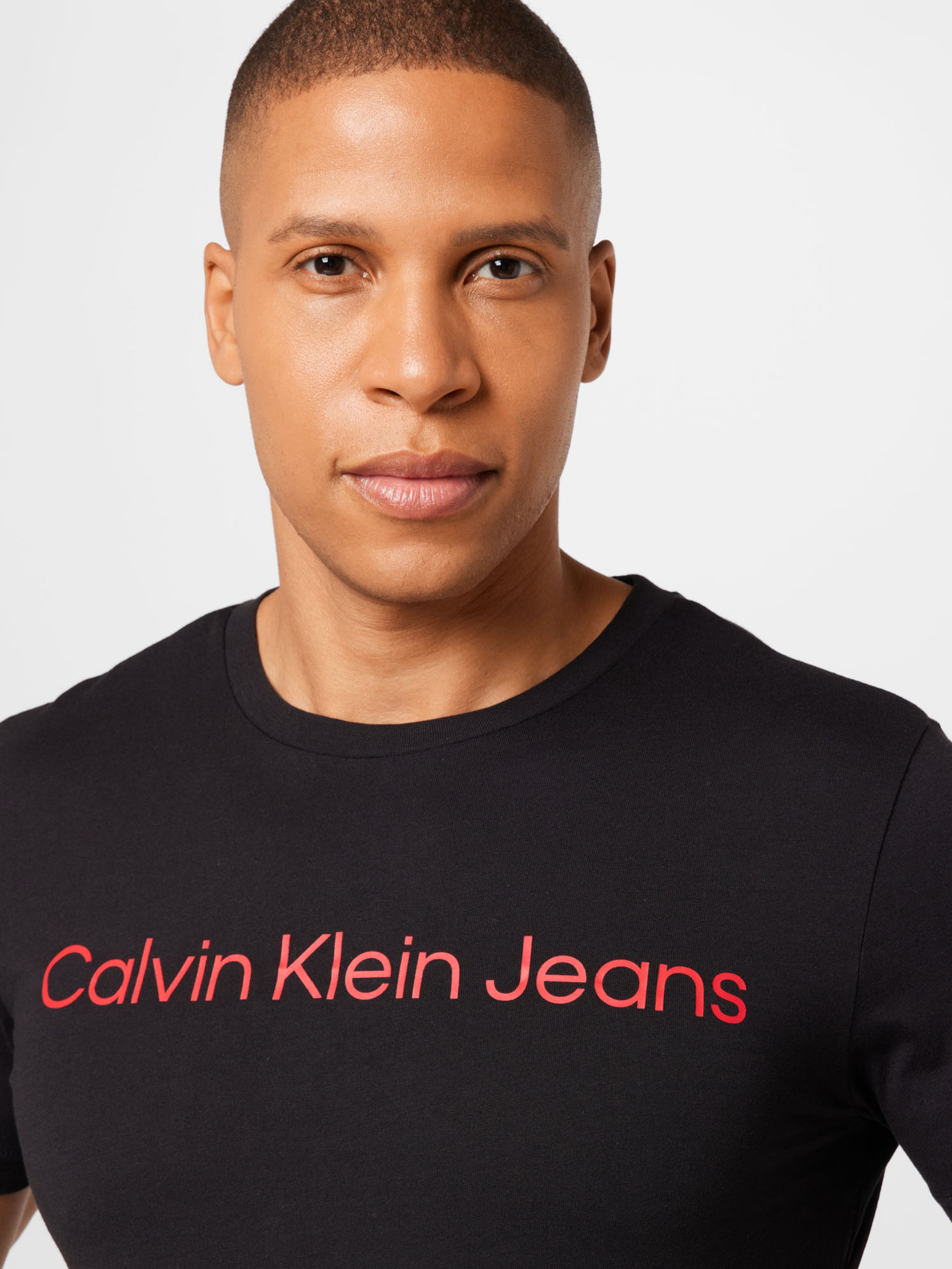 Calvin klein jeans t hotsell shirt red