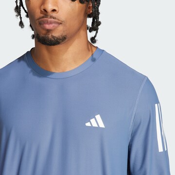 ADIDAS PERFORMANCE Functioneel shirt 'Own The Run' in Blauw