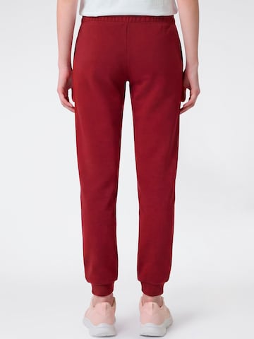 Tapered Pantaloni di Champion in rosso