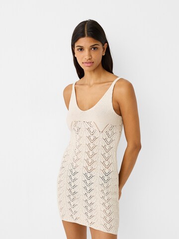 Bershka Knitted dress in Beige: front