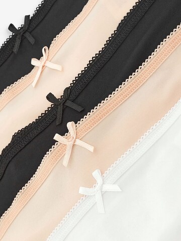 Next String i beige
