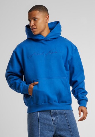 Karl Kani Collegepaita 'Autograph' värissä sininen