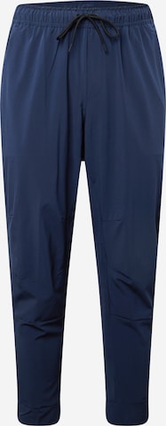 Effilé Pantalon de sport 'UNLIMITED' NIKE en bleu : devant