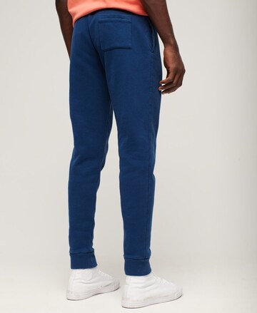 Effilé Pantalon Superdry en bleu