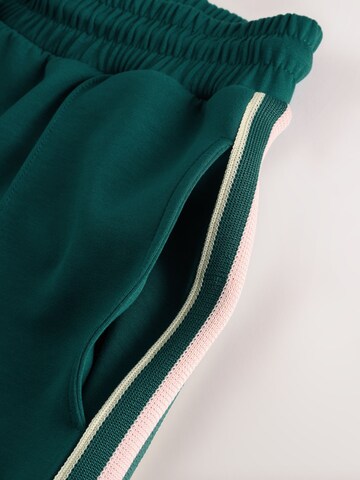 Next Широки крачоли Функционален панталон в зелено