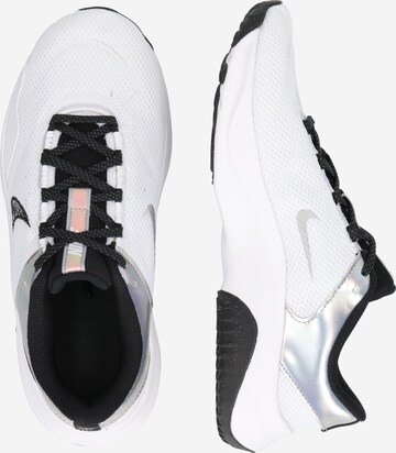 Chaussure de course NIKE en blanc