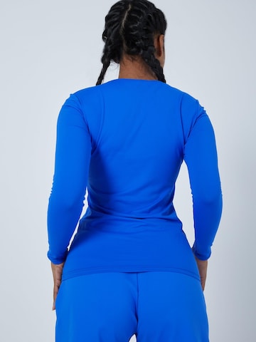 Maglia funzionale 'Longsleeve' di SPORTKIND in blu
