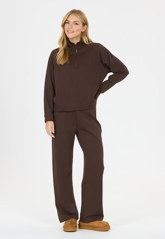 Athlecia Regular Sports trousers 'Franye' in Brown