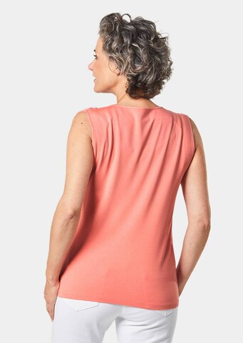 Haut Goldner en orange