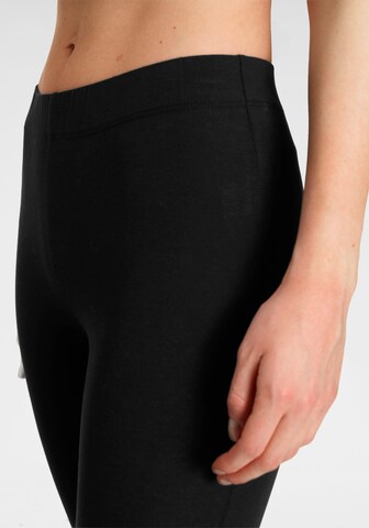 FLASHLIGHTS Skinny Leggings in Schwarz