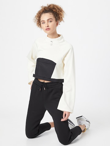PUMA Спортен пуловер 'First Mile' в бяло