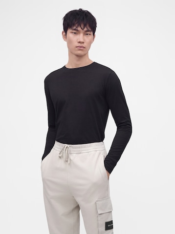 balta Calvin Klein Jeans Siaurėjantis Laisvo stiliaus kelnės