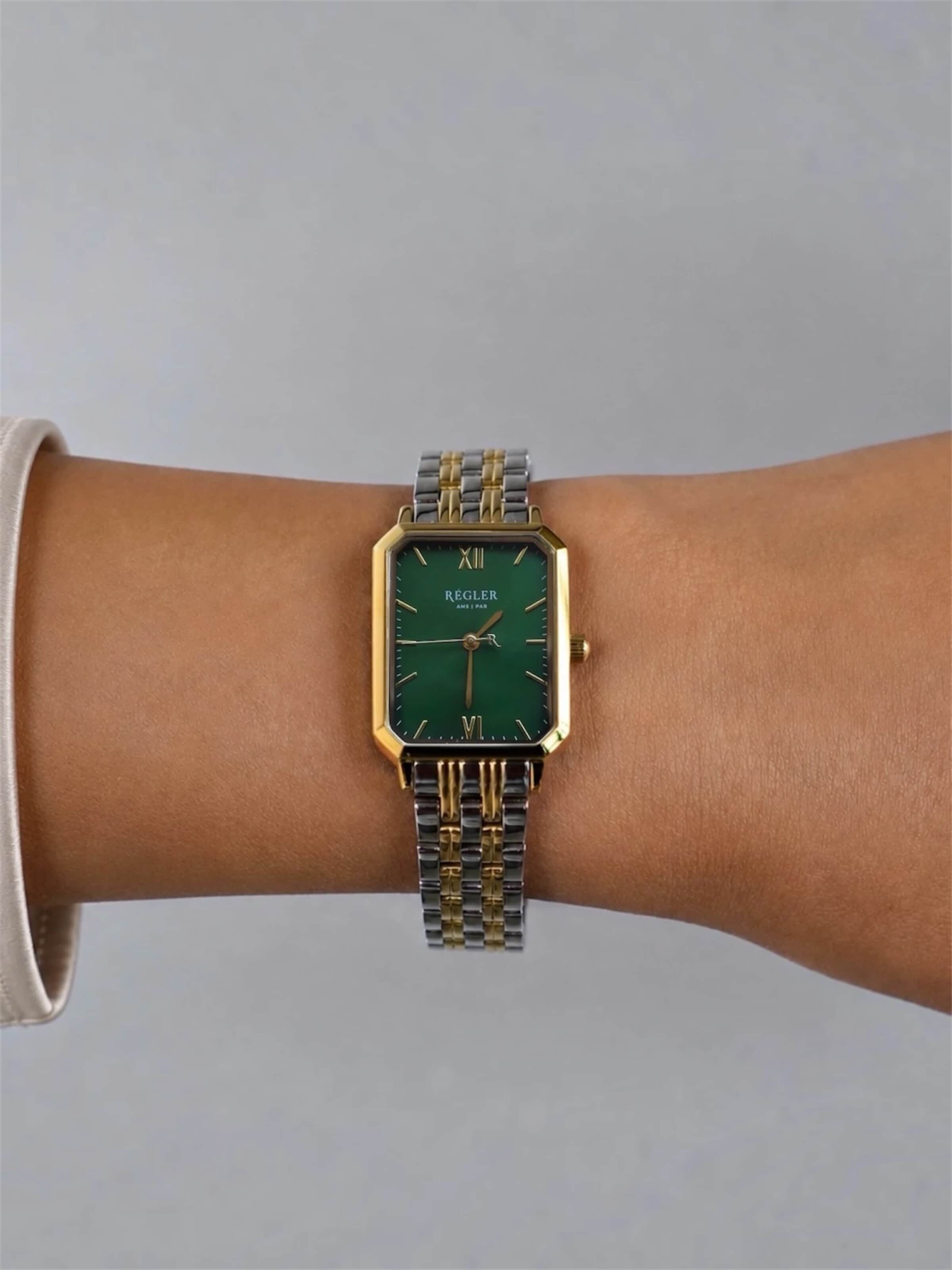 Régler Analogové hodinky 'Régler Élégance Steel Bicolor Silver/Gold - Green' – zlatá