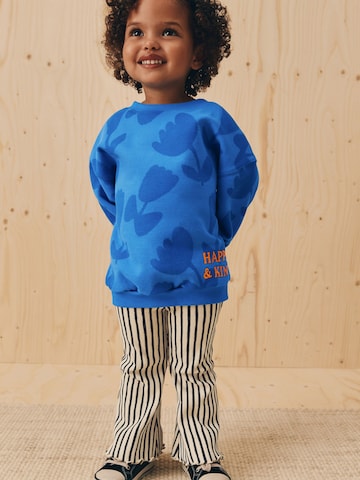 Next Set in Blue: front