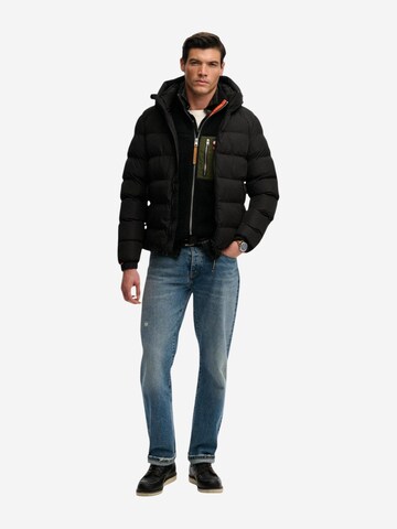 Superdry Winterjas 'Hooded Sports Puffer Jacket SDM5011905A' in Zwart