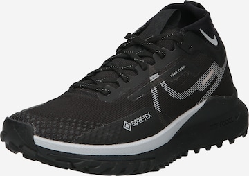 NIKE Running Shoes 'REACT PEGASUS TRAIL 4' in Black: front