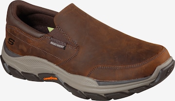 SKECHERS Slip-Ons in Brown