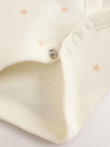 Next Sparkdräkt/body i beige