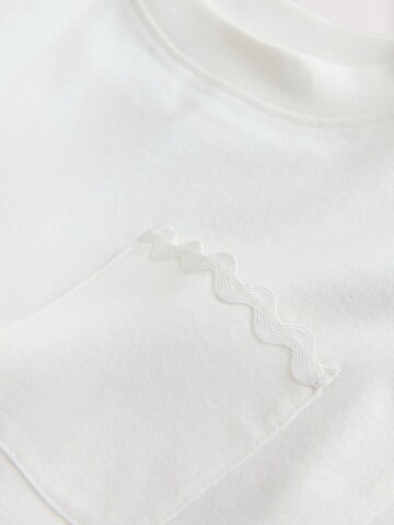 T-Shirt Next en blanc