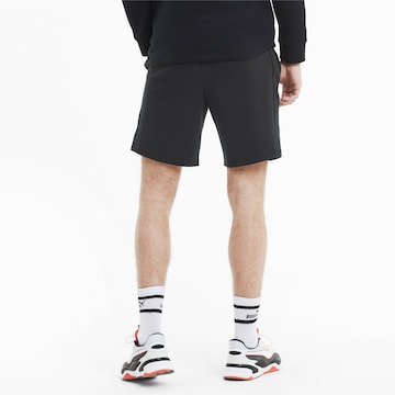 Regular Pantaloni sport de la PUMA pe negru