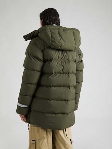 HELLY HANSEN Зимняя куртка 'Aspire' в Зеленый