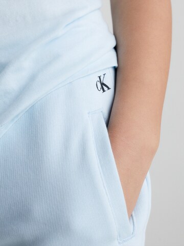 Calvin Klein Jeans Štandardný strih Nohavice - Modrá